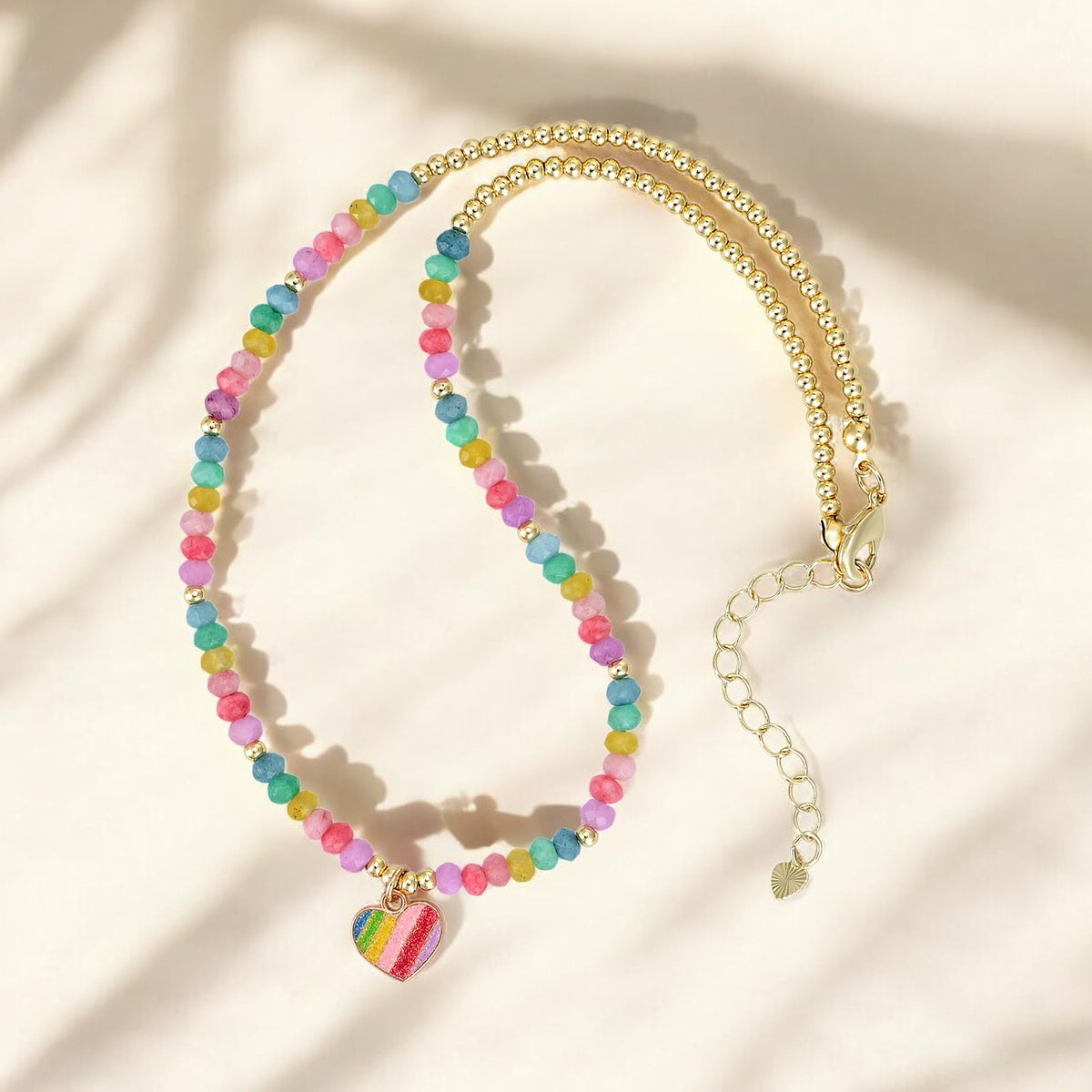 Collier en forme de cœur pastel