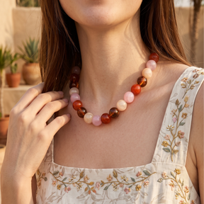 Collier à grosses perles roses