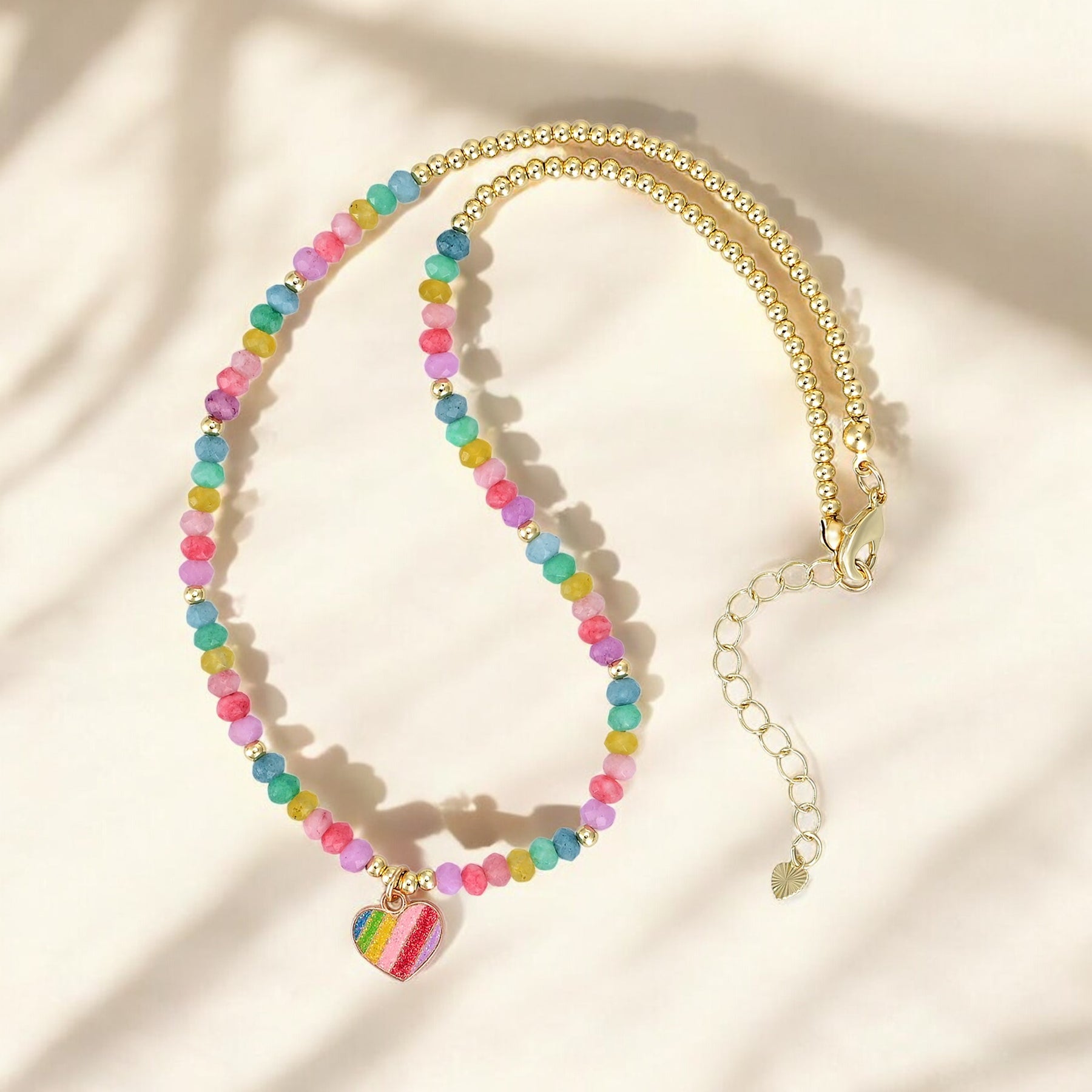 Collier en forme de cœur pastel