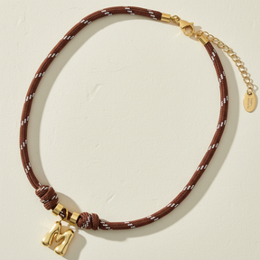 Collier corde lettre bulle dorée